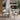 White Arnbjerg chairs around a table